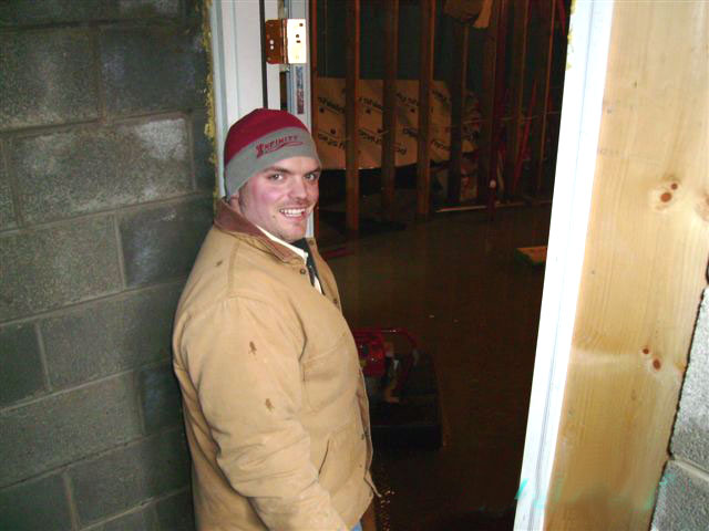 PCTVFD member Josh helping pump flooded home PCTVFD member Josh helping pump flooded home